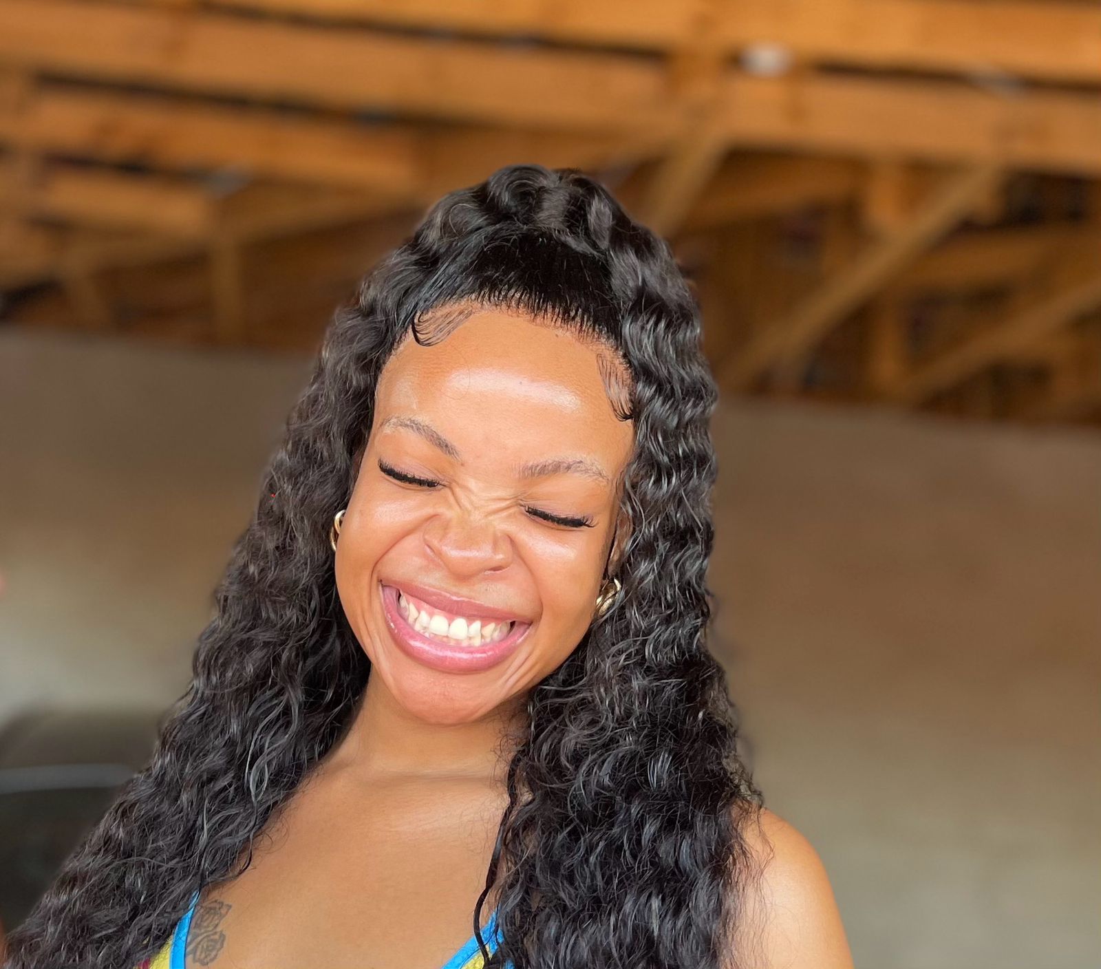Collien Ntsako Mabunda holding ForeverGlow product